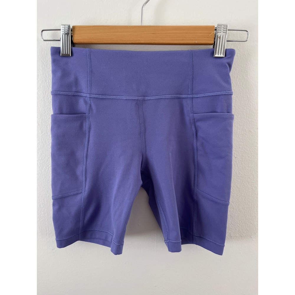 Athleta Girl Stash Your Treasures Bike Shorts Purple SZ L 12 Activewear Pockets